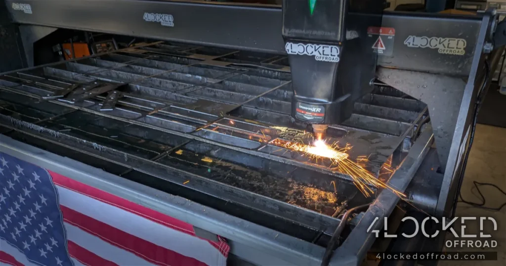 CNC Cutting Replacement Vertical Supports – April 2025 CNC plasma cutting replacement vertical supports with sparks flying at 4Locked Offroad, April 2025.