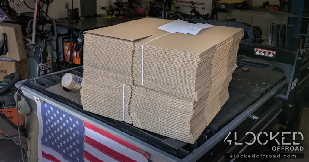Shipping Boxes Ready for Final Fulfillment – Heavy Duty Brackets Stack of flattened corrugated shipping boxes prepared for packaging heavy duty ARB brackets