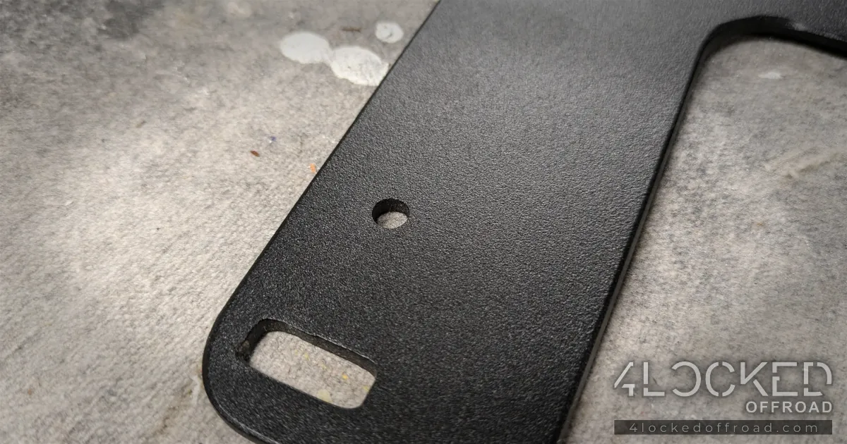 Close-up of the missing M6 PEM stud — the disclosed B-Stock defect. The mounting hole is intact and accepts a standard M6 fastener.
